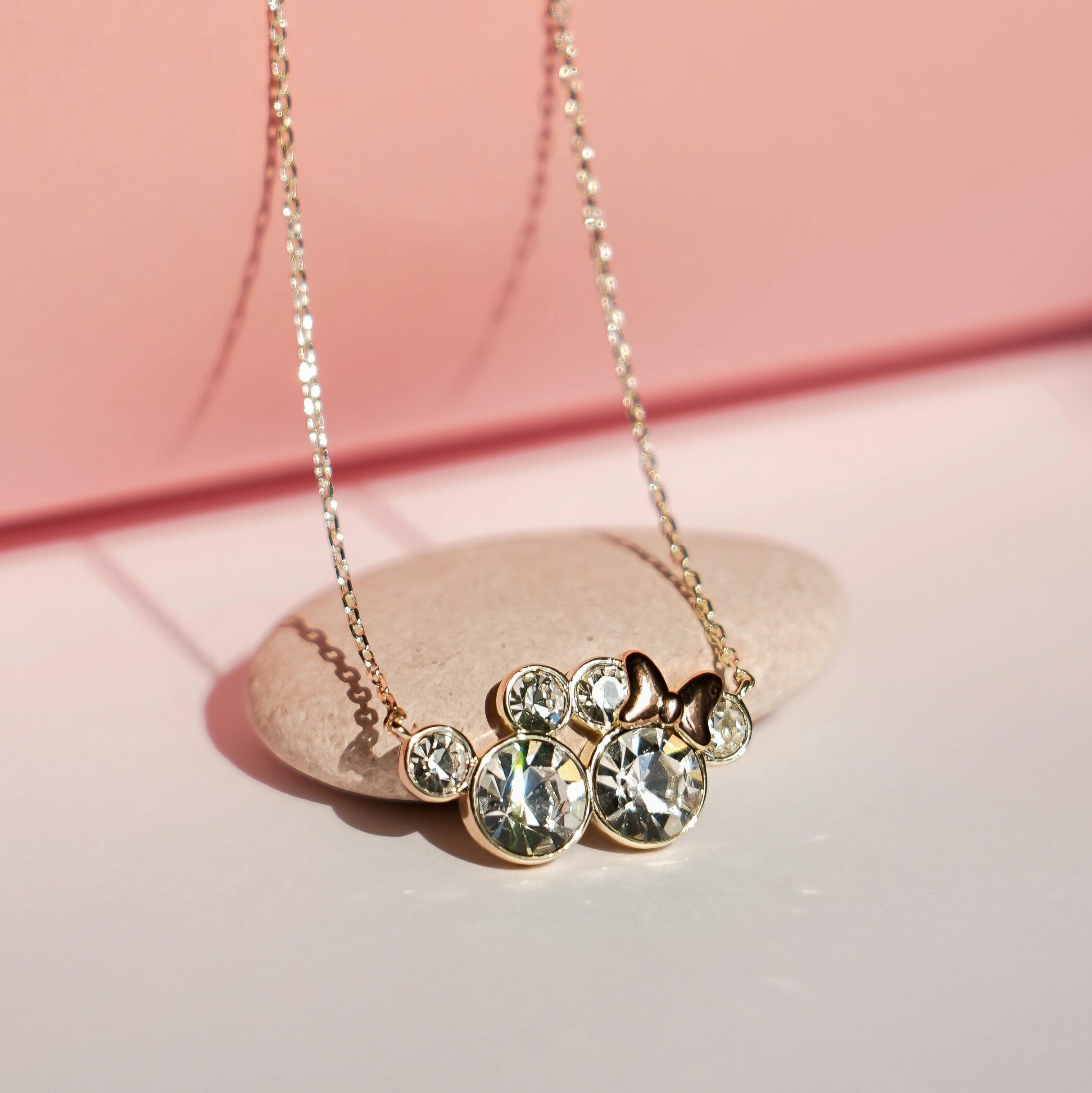 A delicate platinum necklace adorned with sparkling diamonds, perfect for special occasions.